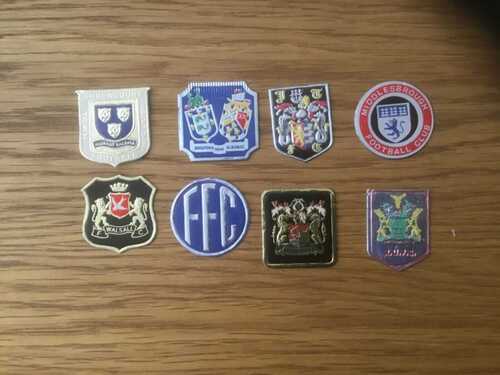 COLLECTION OF 8 1960s /70s FOIL TYPE BADGES ALL IN GOOD CONDITION