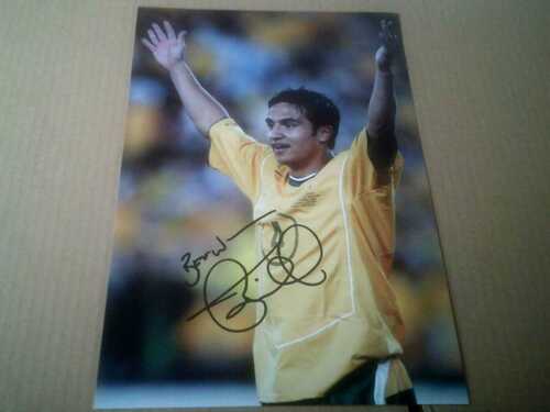 TIM CAHILL  12x8